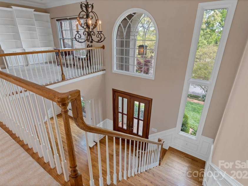 4465 3rd Street, Hickory, NC 28601.  MLS# CAR4247414, YatesRealty ID 12028. Upper level loft looking down to foyer