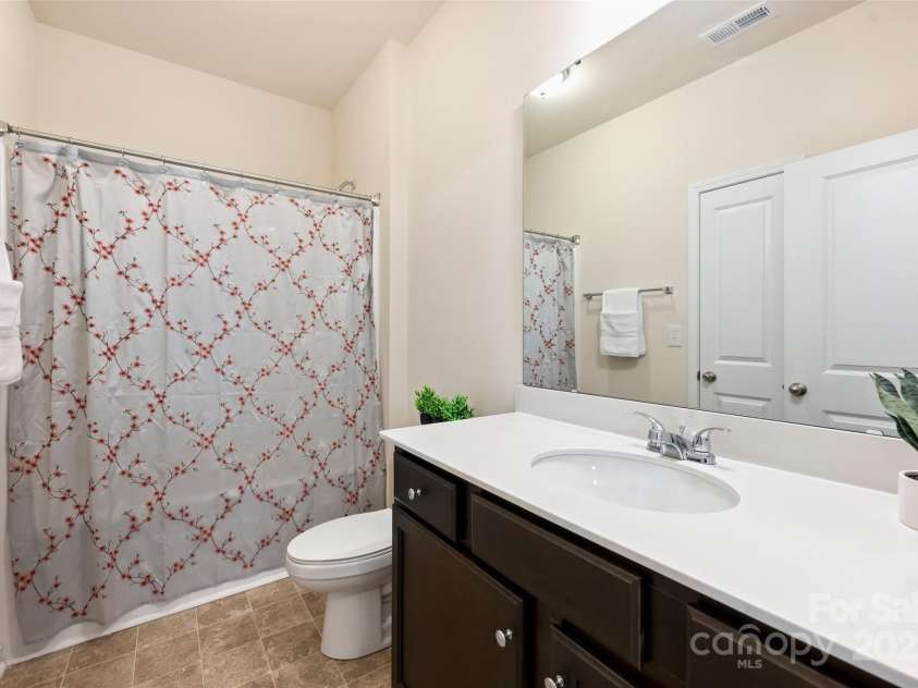 8853 Brakeman Drive, Waxhaw, NC 28173.  MLS# CAR4256779, YatesRealty ID 12029. Guest Bathroom Main Level