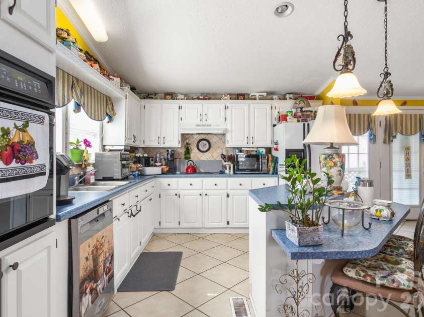 900 Ingle Street, Gibsonville, NC 27249.  MLS# CAR4352263, YatesRealty ID 12031. 