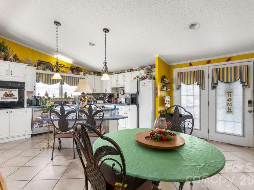 900 Ingle Street, Gibsonville, NC 27249.  MLS# CAR4352263, YatesRealty ID 12031. 