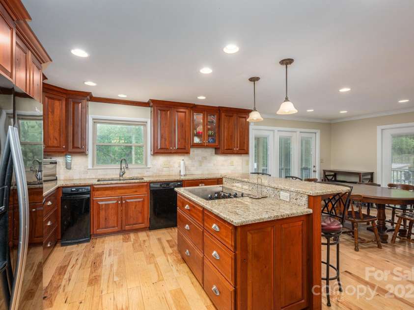 227 Country Club Circle, Shelby, NC 28150.  MLS# CAR4256011, YatesRealty ID 12032. ...a trash compactor, dishwasher and fabulous two-tiered center island with extra seating!