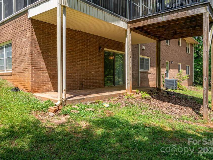 227 Country Club Circle, Shelby, NC 28150.  MLS# CAR4256011, YatesRealty ID 12032. Covered patio off the basement