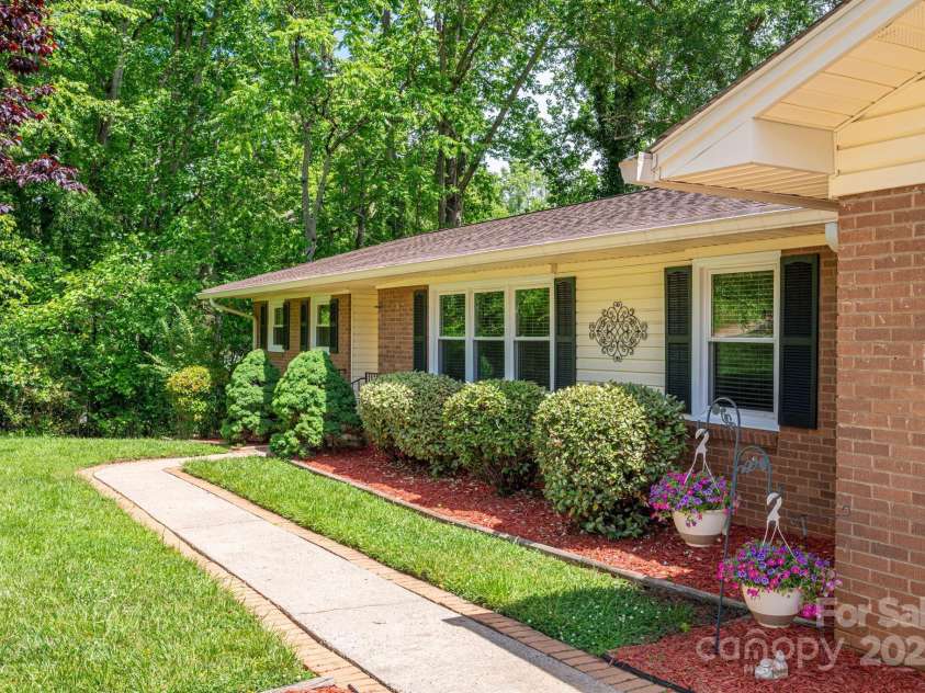 227 Country Club Circle, Shelby, NC 28150.  MLS# CAR4256011, YatesRealty ID 12032. Meticulous landscaping offers fabulous curb appeal!