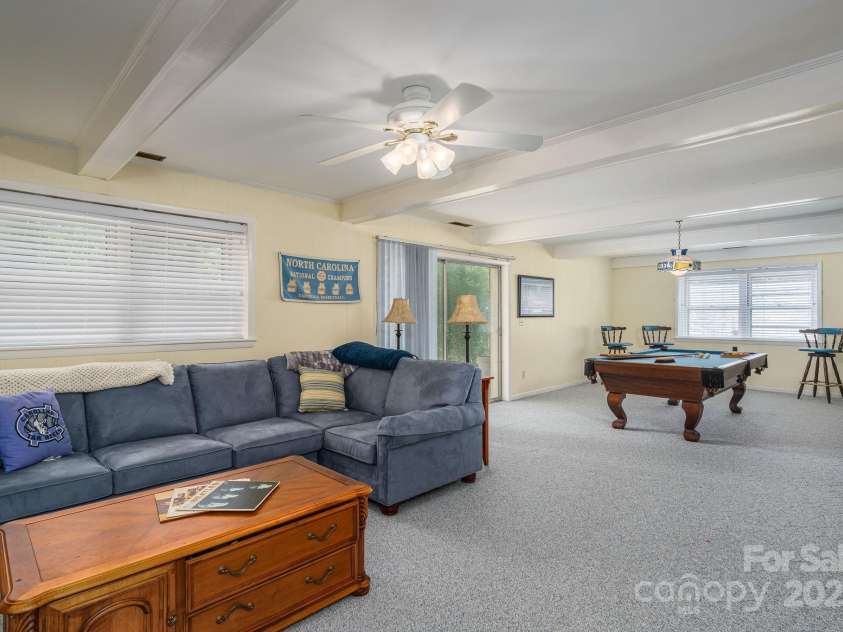 227 Country Club Circle, Shelby, NC 28150.  MLS# CAR4256011, YatesRealty ID 12032. The expansive finished basement includes this rec room...