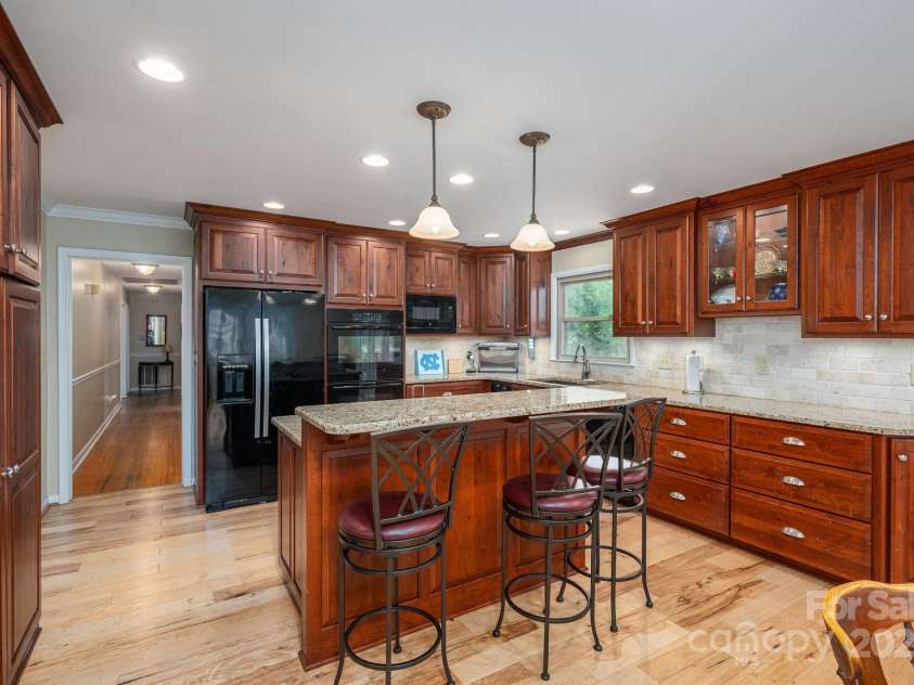 227 Country Club Circle, Shelby, NC 28150.  MLS# CAR4256011, YatesRealty ID 12032. The hallway on the left leads to the bedrooms.