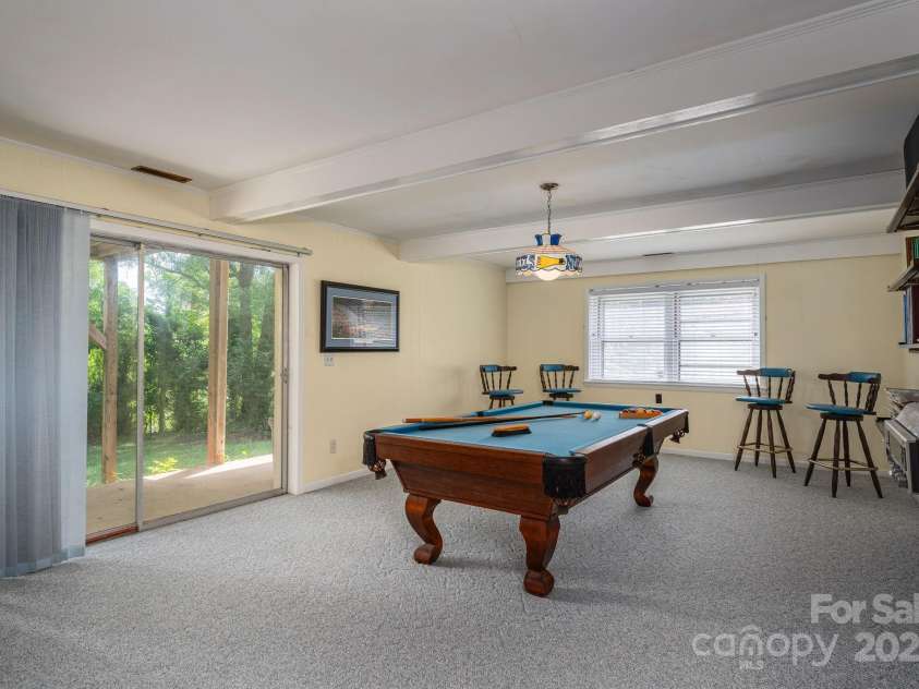 227 Country Club Circle, Shelby, NC 28150.  MLS# CAR4256011, YatesRealty ID 12032. There are sliding glass doors in the basement that lead to the back yard.