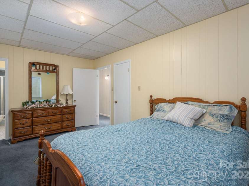 227 Country Club Circle, Shelby, NC 28150.  MLS# CAR4256011, YatesRealty ID 12032. This bedroom in the basement has access to the hall bathroom.