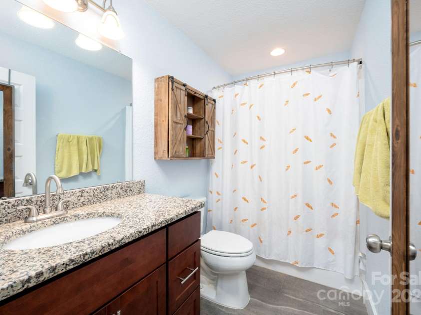 75 Dry Ridge, Canton, NC 28716.  MLS# CAR4232020, YatesRealty ID 12034. Shared Full Bathroom with Tile Flooring and Granite Vanity Top