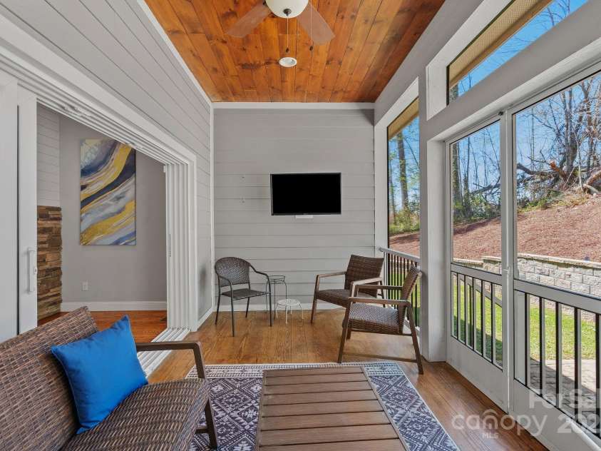 3511 Chimney Rock Road, Hendersonville, NC 28792.  MLS# CAR4242535, YatesRealty ID 12035. Summer living at its best