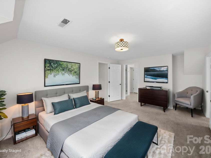 21 Bowen Drive, Belmont, NC 28012.  MLS# CAR4368303, YatesRealty ID 12038. Primary bedroom staged angle 1