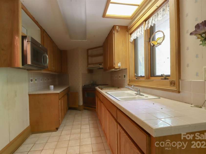 388 Island Creek Road, Lake Lure, NC 28746.  MLS# CAR4062749, YatesRealty ID 1204. Butler's Pantry