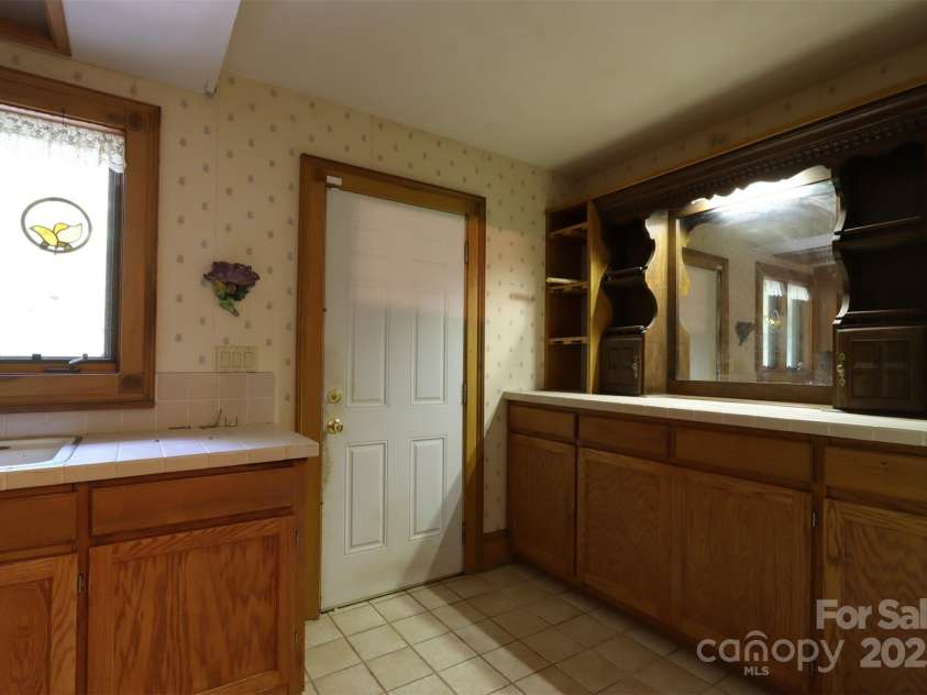 388 Island Creek Road, Lake Lure, NC 28746.  MLS# CAR4062749, YatesRealty ID 1204. Butler's Pantry