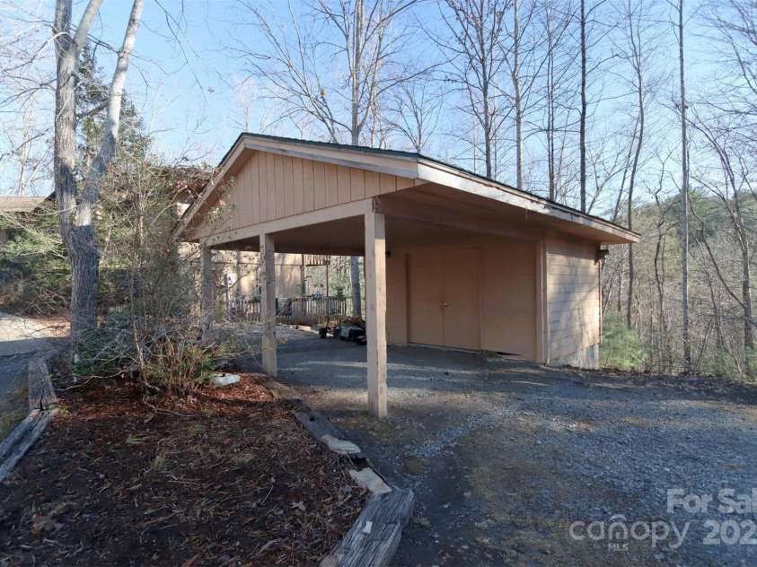 388 Island Creek Road, Lake Lure, NC 28746.  MLS# CAR4062749, YatesRealty ID 1204. Carport for Main House
