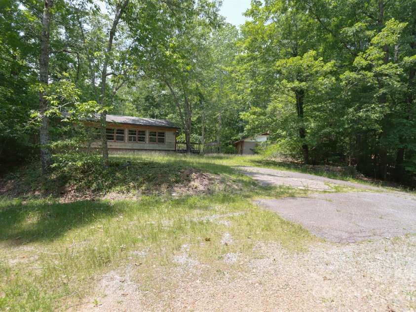388 Island Creek Road, Lake Lure, NC 28746.  MLS# CAR4062749, YatesRealty ID 1204. Driveway to additional mfg. home