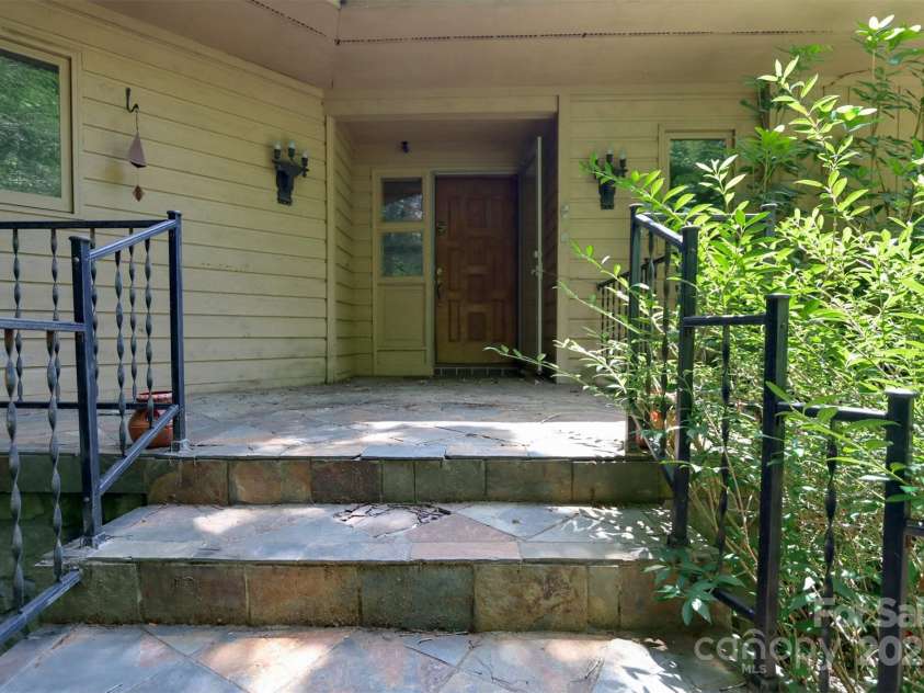 388 Island Creek Road, Lake Lure, NC 28746.  MLS# CAR4062749, YatesRealty ID 1204. Front Entry