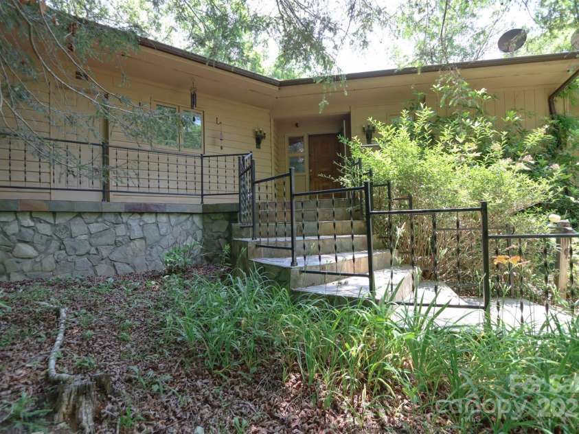 388 Island Creek Road, Lake Lure, NC 28746.  MLS# CAR4062749, YatesRealty ID 1204. Front Entry