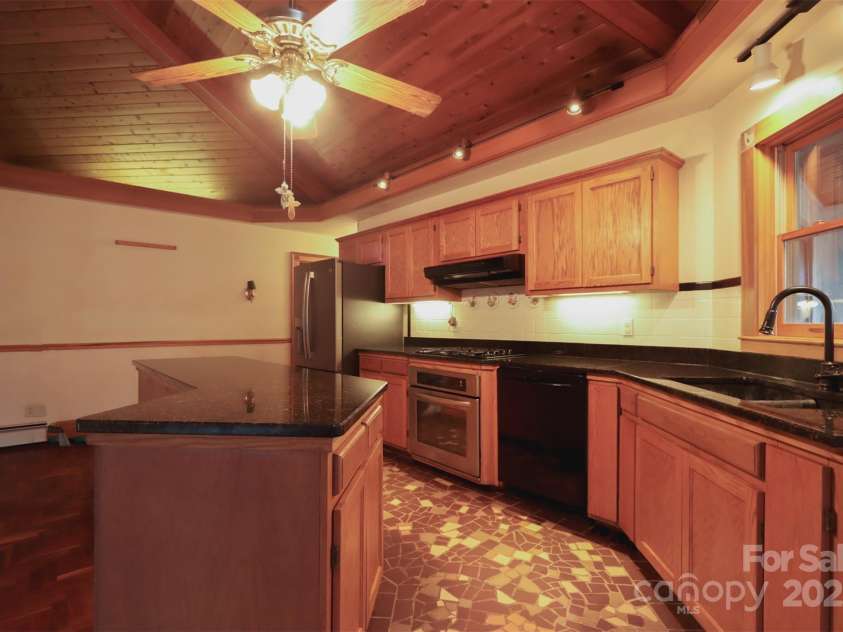 388 Island Creek Road, Lake Lure, NC 28746.  MLS# CAR4062749, YatesRealty ID 1204. Kitchen Main House