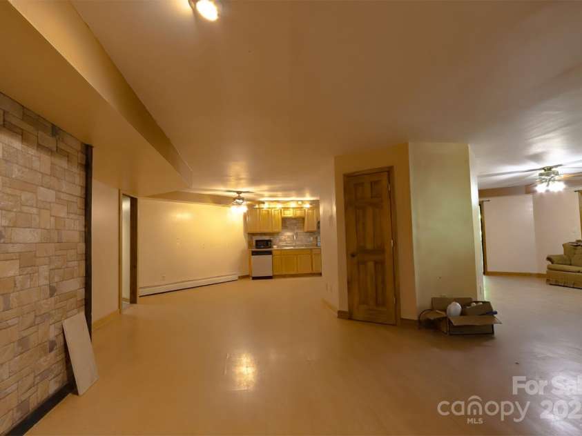 388 Island Creek Road, Lake Lure, NC 28746.  MLS# CAR4062749, YatesRealty ID 1204. Lower level