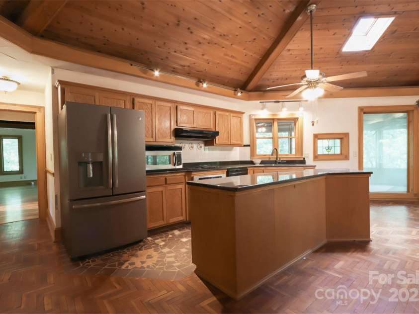 388 Island Creek Road, Lake Lure, NC 28746.  MLS# CAR4062749, YatesRealty ID 1204. Main level kitchen