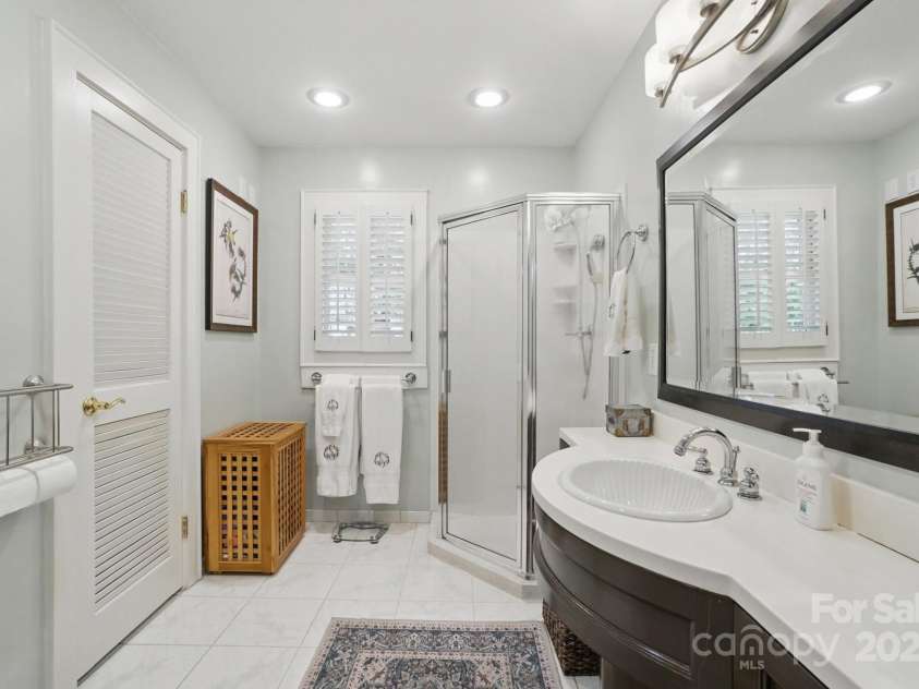 13916 & 13912 Sledge Road, Charlotte, NC 28278.  MLS# CAR4248245, YatesRealty ID 12040. Downstairs bathroom