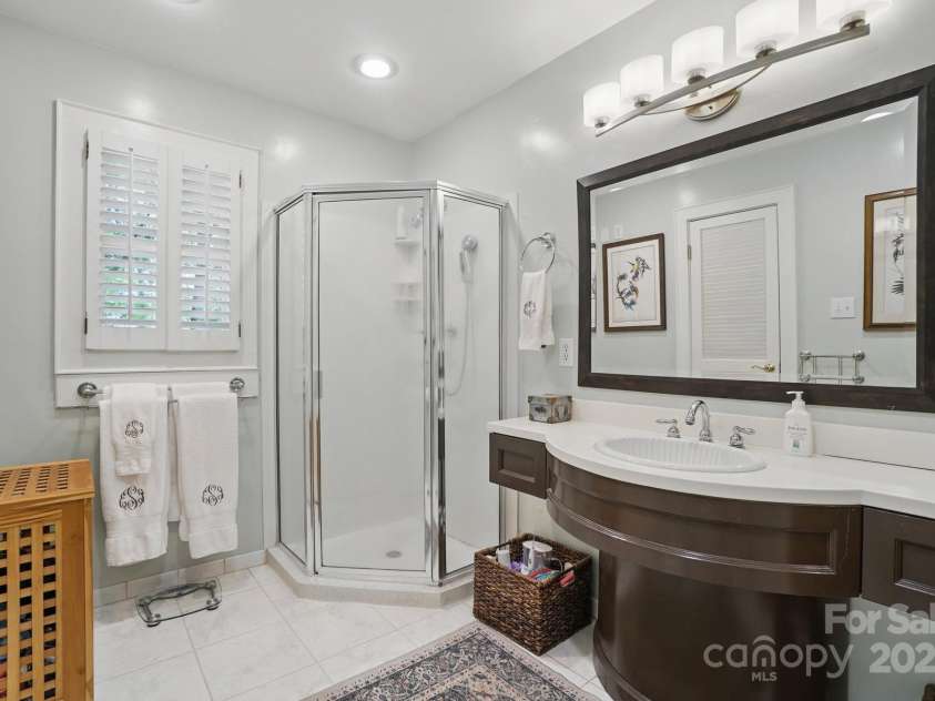 13916 & 13912 Sledge Road, Charlotte, NC 28278.  MLS# CAR4248245, YatesRealty ID 12040. Downstairs bathroom