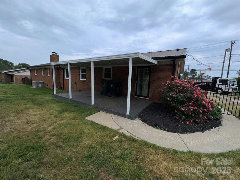 396 Pitts School Road, Concord, NC 28027.  MLS# CAR4251214, YatesRealty ID 12047. Exterior rear view