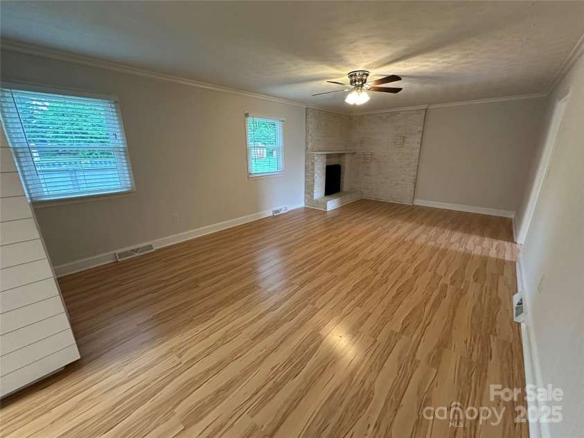 396 Pitts School Road, Concord, NC 28027.  MLS# CAR4251214, YatesRealty ID 12047. From your Kitchen to the Den with window treatments already in place