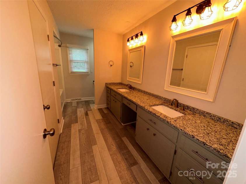 396 Pitts School Road, Concord, NC 28027.  MLS# CAR4251214, YatesRealty ID 12047. Full Bath #2 - renovated - Granite C-tops, mirrors & light fixtures