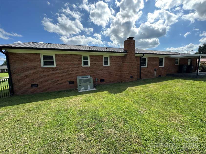 396 Pitts School Road, Concord, NC 28027.  MLS# CAR4251214, YatesRealty ID 12047. View from inside Fenced Backyard