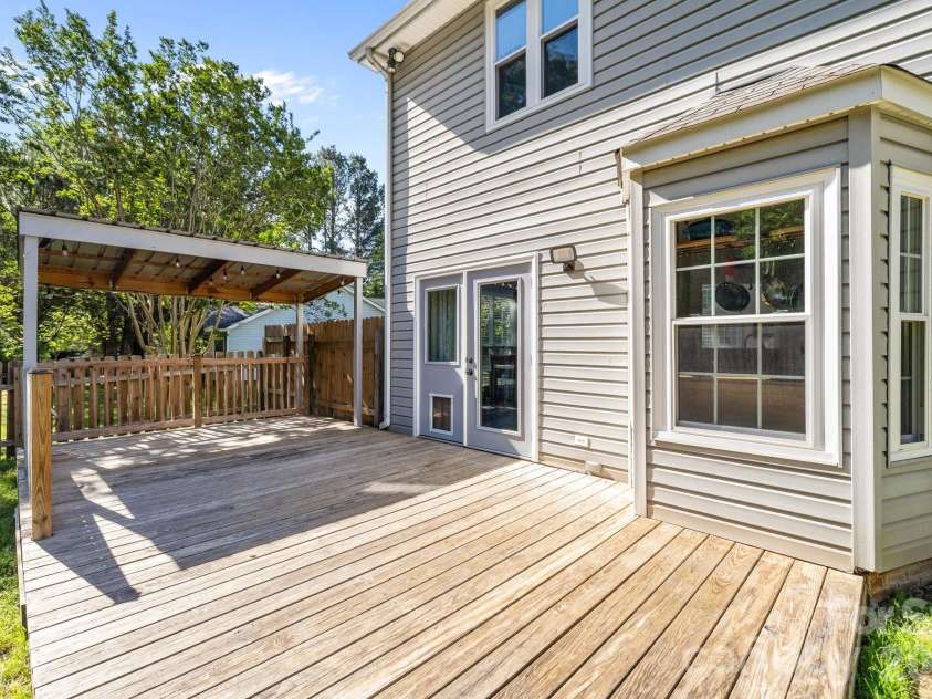13914 Loch Loyal Drive, Charlotte, NC 28273.  MLS# CAR4363842, YatesRealty ID 12049. Rear deck area