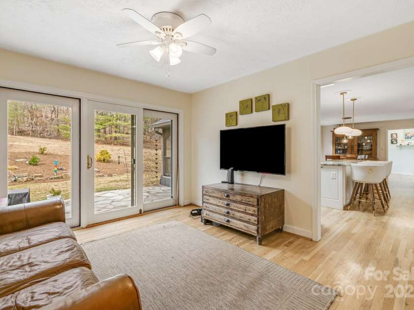 53 Jump Cove Road, Weaverville, NC 28787.  MLS# CAR4209397, YatesRealty ID 12056. Additional Sitting Room/Media Room off of Kitchen