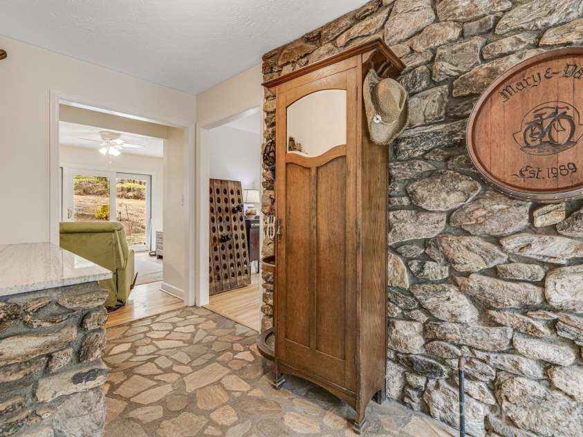 53 Jump Cove Road, Weaverville, NC 28787.  MLS# CAR4209397, YatesRealty ID 12056. Custom Stonework