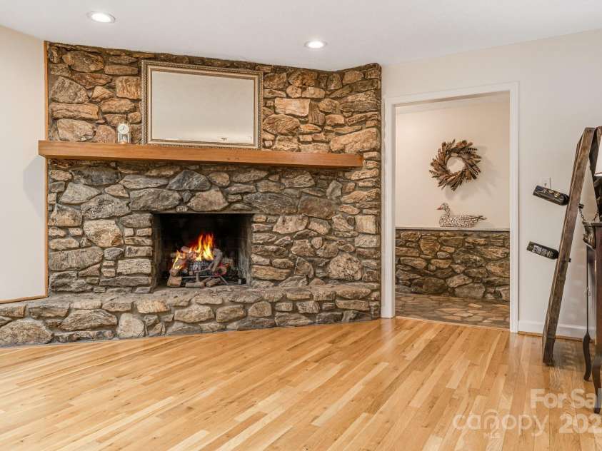 53 Jump Cove Road, Weaverville, NC 28787.  MLS# CAR4209397, YatesRealty ID 12056. Gas Fire logs for chilly mornings