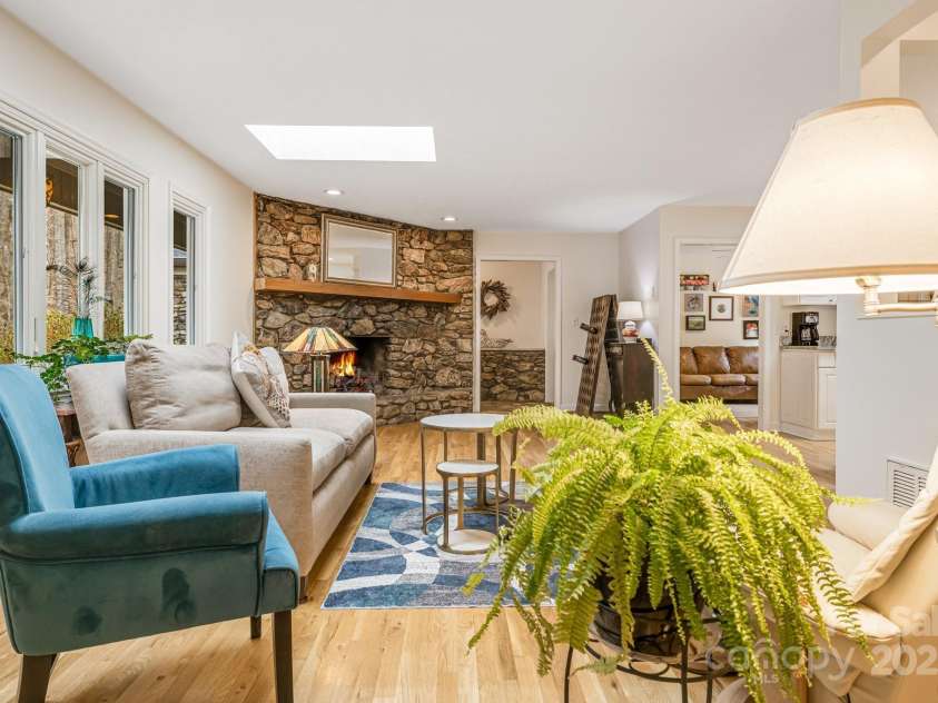 53 Jump Cove Road, Weaverville, NC 28787.  MLS# CAR4209397, YatesRealty ID 12056. Living Room adjacent to kitchen