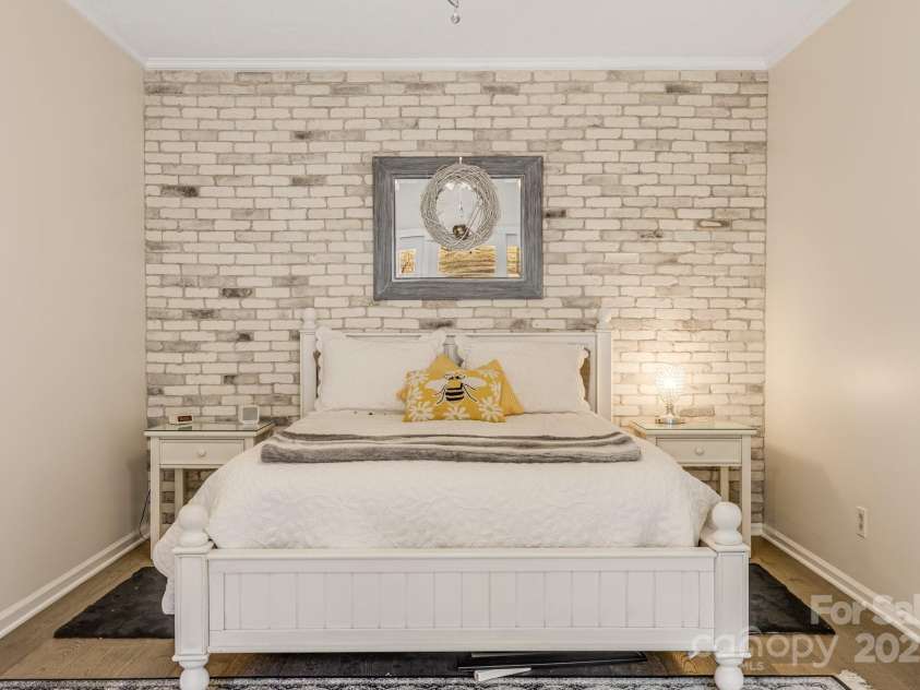 53 Jump Cove Road, Weaverville, NC 28787.  MLS# CAR4209397, YatesRealty ID 12056. Master Bedroom with custom brickwork