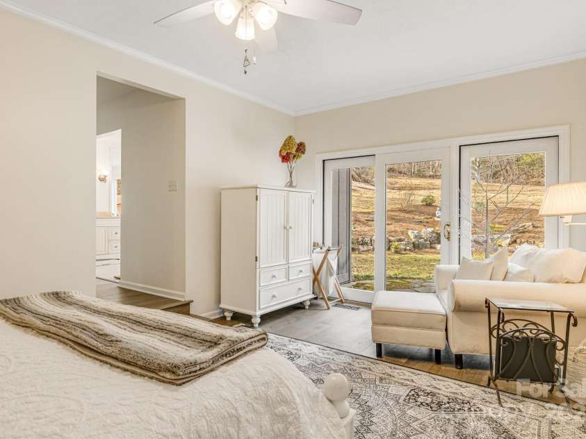 53 Jump Cove Road, Weaverville, NC 28787.  MLS# CAR4209397, YatesRealty ID 12056. Primary Opens to Back Patio