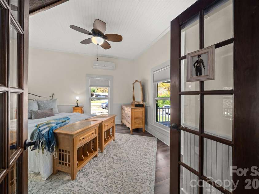 125 Timberline Drive, Maggie Valley, NC 28751.  MLS# CAR4365307, YatesRealty ID 12058. Entry to the main level bedroom