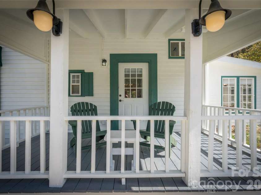 125 Timberline Drive, Maggie Valley, NC 28751.  MLS# CAR4365307, YatesRealty ID 12058. Side porch on main level