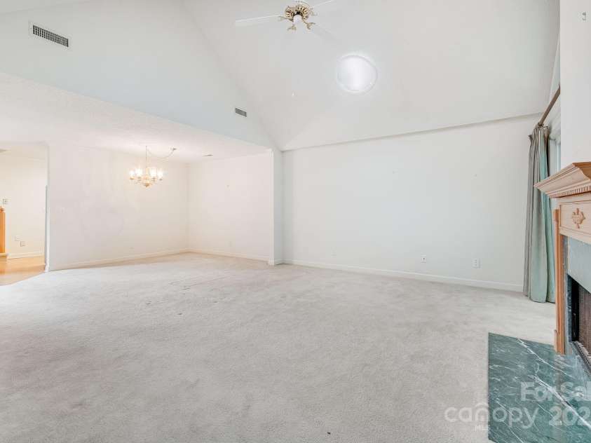 57 Lake Pointe Circle, Hendersonville, NC 28792.  MLS# CAR4255350, YatesRealty ID 12058. Spacious Living Room