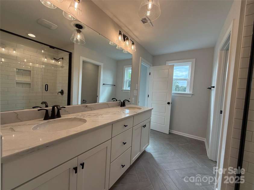2216 Camber Drive, Gastonia, NC 28054.  MLS# CAR4223922, YatesRealty ID 12061. Premier Bath