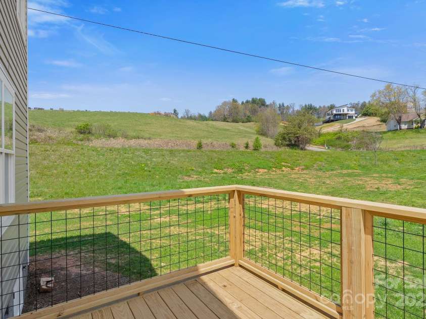 208 Sycamore Farm Road, Leicester, NC 28748.  MLS# CAR4237667, YatesRealty ID 12064. Back deck