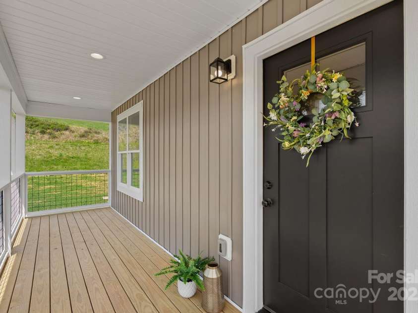 208 Sycamore Farm Road, Leicester, NC 28748.  MLS# CAR4237667, YatesRealty ID 12064. Front entryway