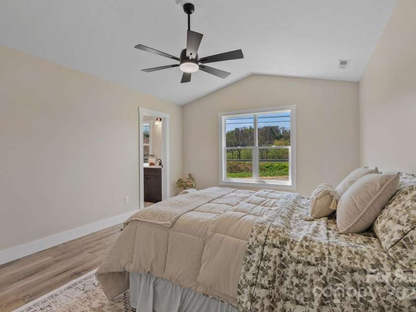 208 Sycamore Farm Road, Leicester, NC 28748.  MLS# CAR4237667, YatesRealty ID 12064. Primary Bedroom