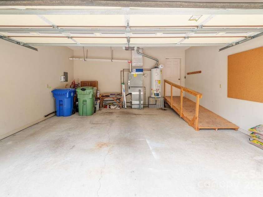 124 Exeter Court, Hendersonville, NC 28791.  MLS# CAR4159638, YatesRealty ID 12066. Large Garage