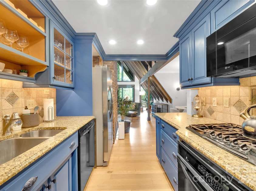 562 West Club Boulevard, Lake Toxaway, NC 28747.  MLS# CAR4199636, YatesRealty ID 1207. 