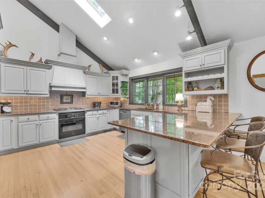 562 West Club Boulevard, Lake Toxaway, NC 28747.  MLS# CAR4199636, YatesRealty ID 1207. 