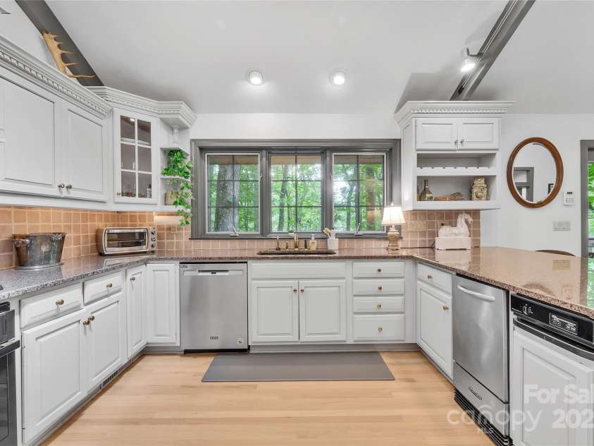 562 West Club Boulevard, Lake Toxaway, NC 28747.  MLS# CAR4199636, YatesRealty ID 1207. 