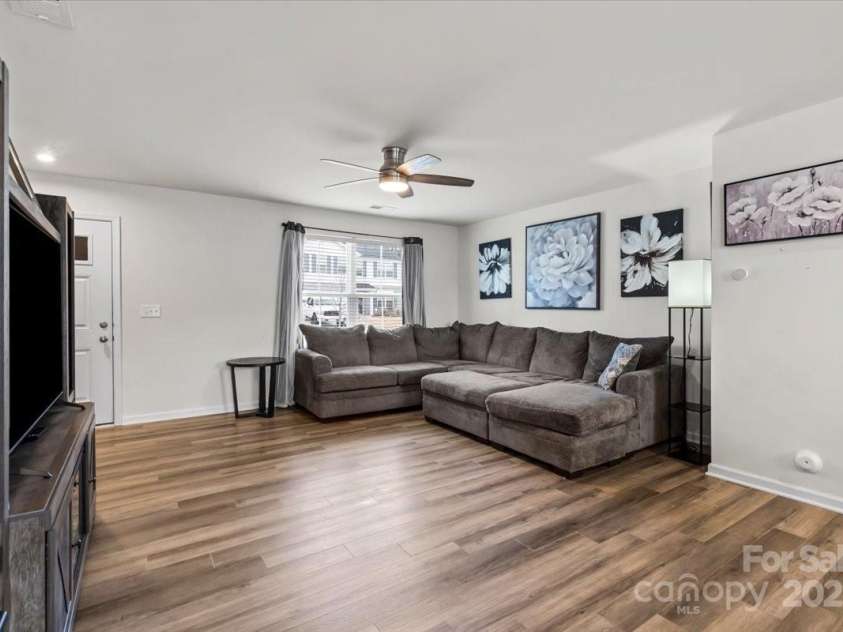 668 Pointe Andrews Drive, Concord, NC 28025.  MLS# CAR4225939, YatesRealty ID 12074. Family room