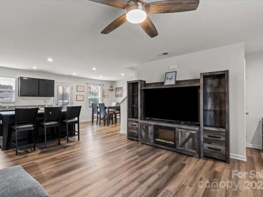 668 Pointe Andrews Drive, Concord, NC 28025.  MLS# CAR4225939, YatesRealty ID 12074. Family room and kitchen