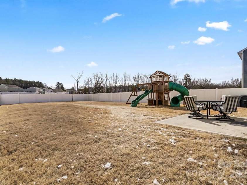 668 Pointe Andrews Drive, Concord, NC 28025.  MLS# CAR4225939, YatesRealty ID 12074. Fully fenced backyard
